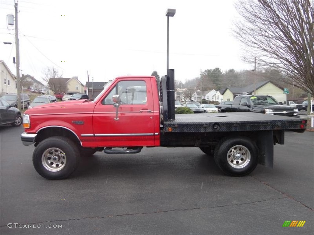 Vermillion Red 1997 Ford F350 XL Regular Cab 4x4 Stake Truck Exterior Photo #77889699