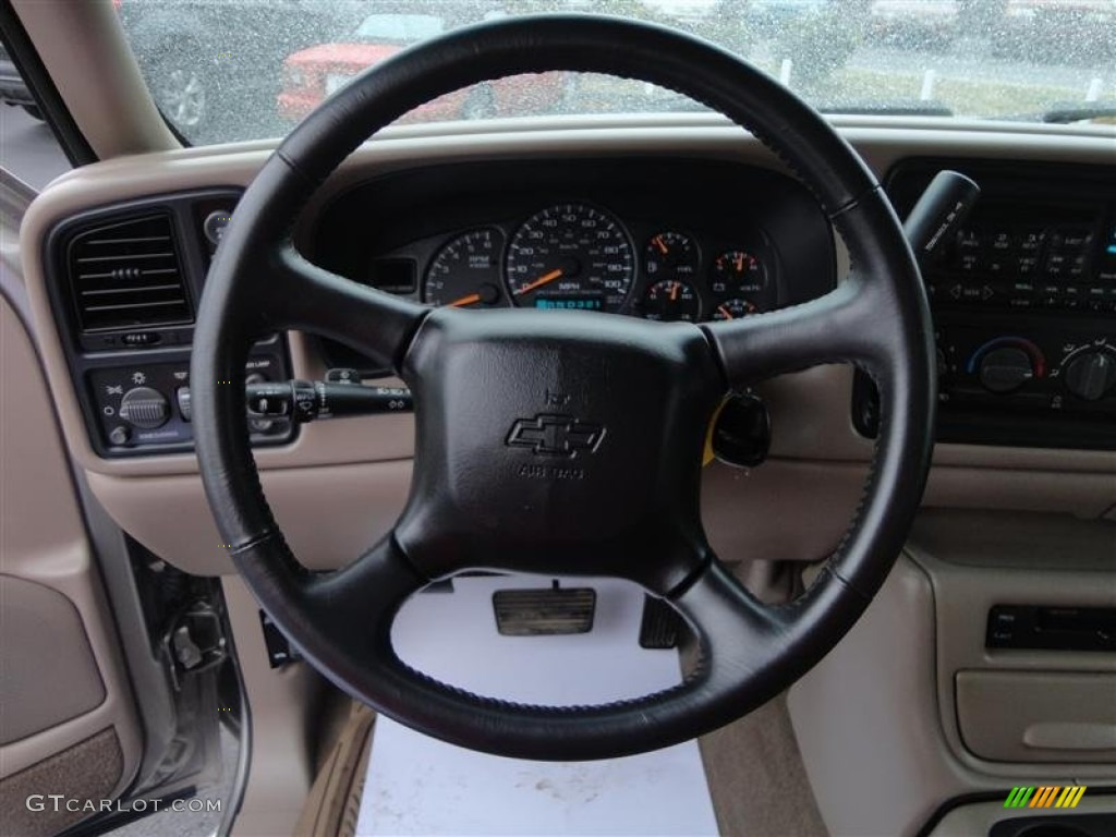 2002 Chevrolet Silverado 1500 LS Extended Cab 4x4 Tan Steering Wheel Photo #77889852