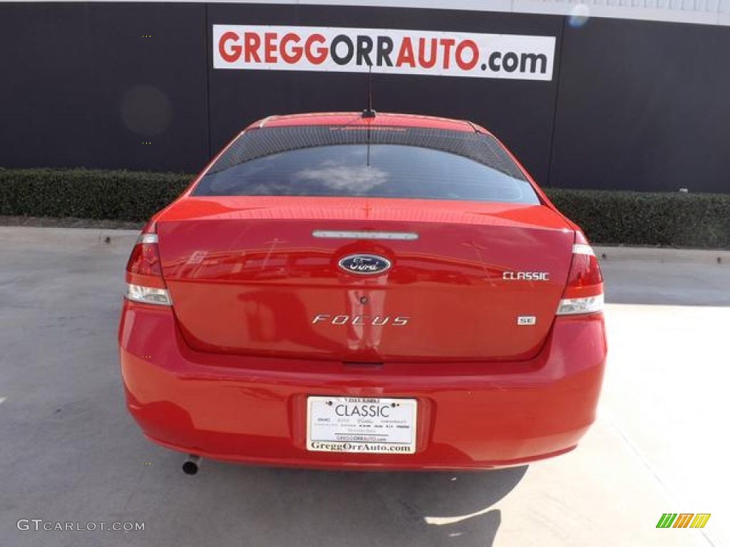 2008 Focus SE Sedan - Vermillion Red / Medium Stone photo #6