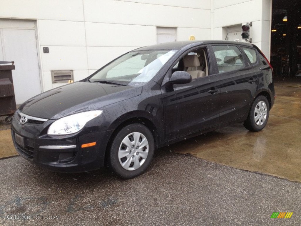 2010 Elantra Touring GLS - Black Pearl / Beige photo #1