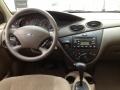 2001 Jackpot Gold Metallic Ford Focus SE Sedan  photo #2