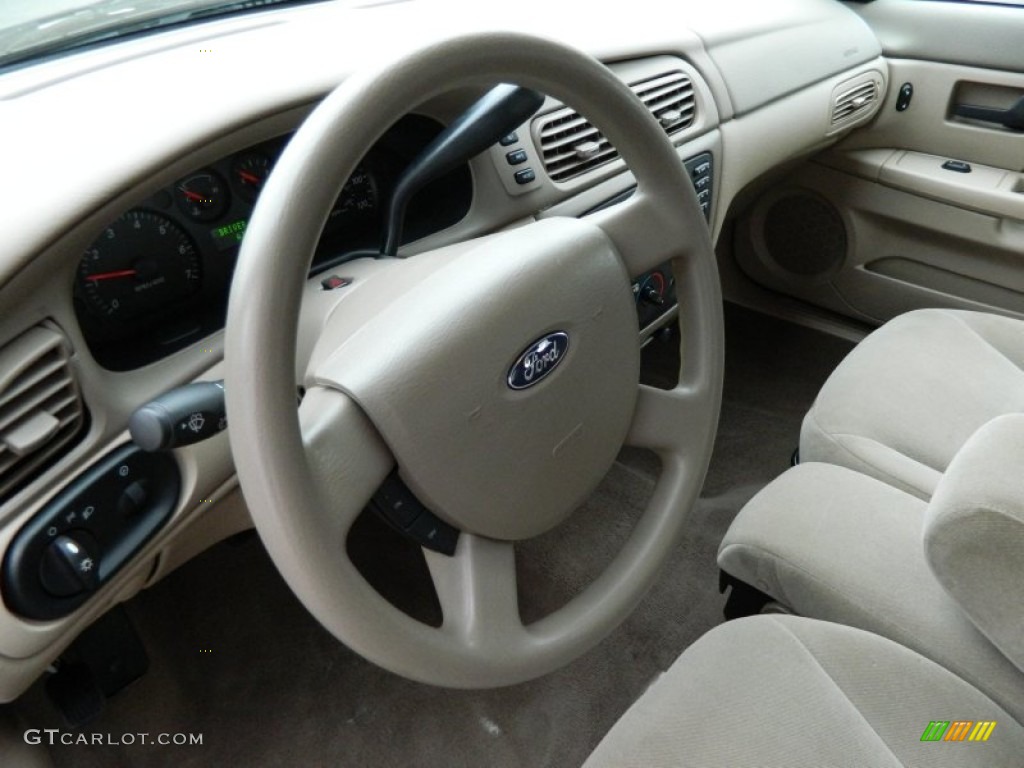 2004 Ford Taurus SES Sedan Medium Parchment Steering Wheel Photo #77928311