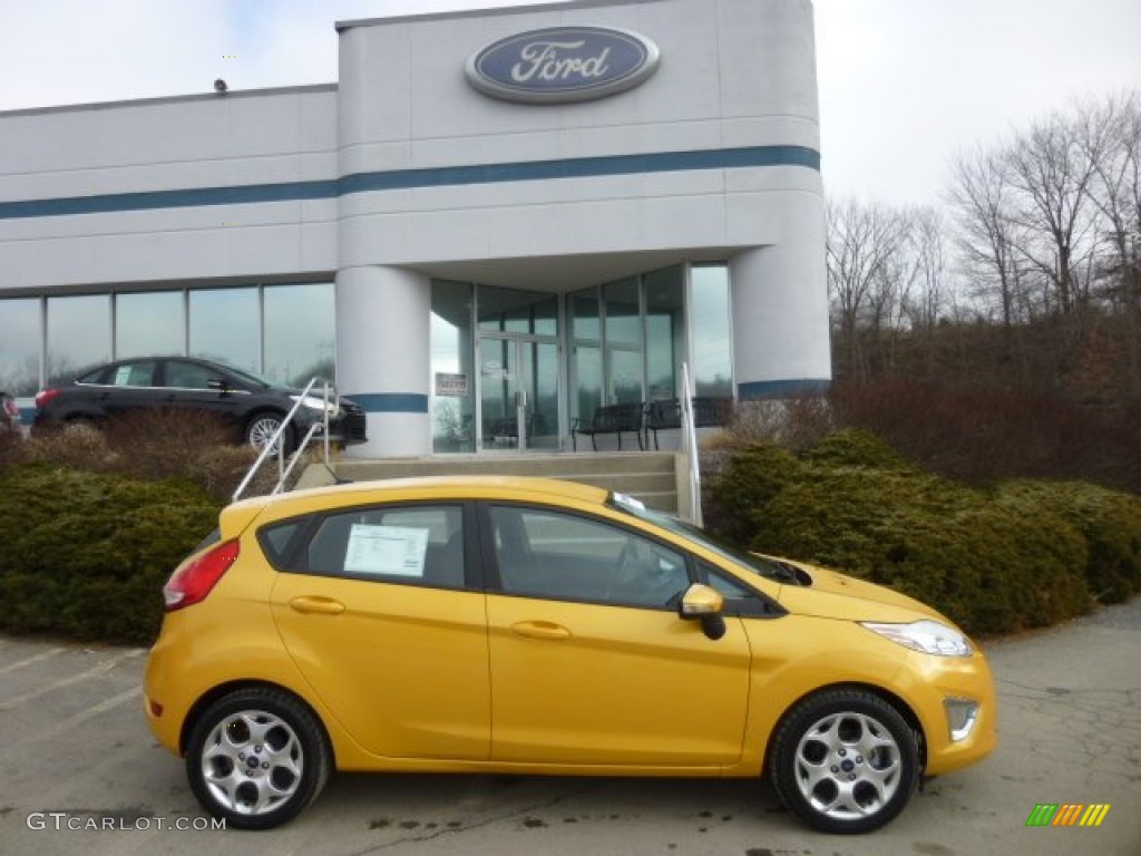 2011 Fiesta SES Hatchback - Yellow Blaze Metallic Tri-Coat / Charcoal Black/Blue Cloth photo #1