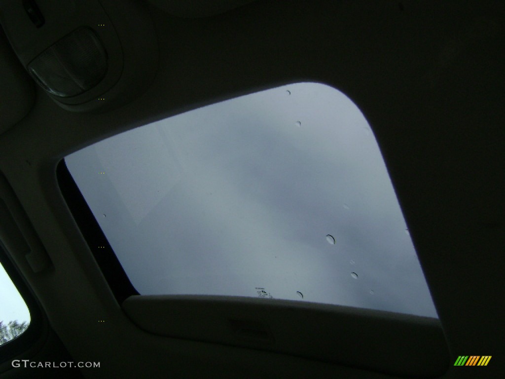 2005 Rainier CXL AWD - Frost White / Cashmere photo #4