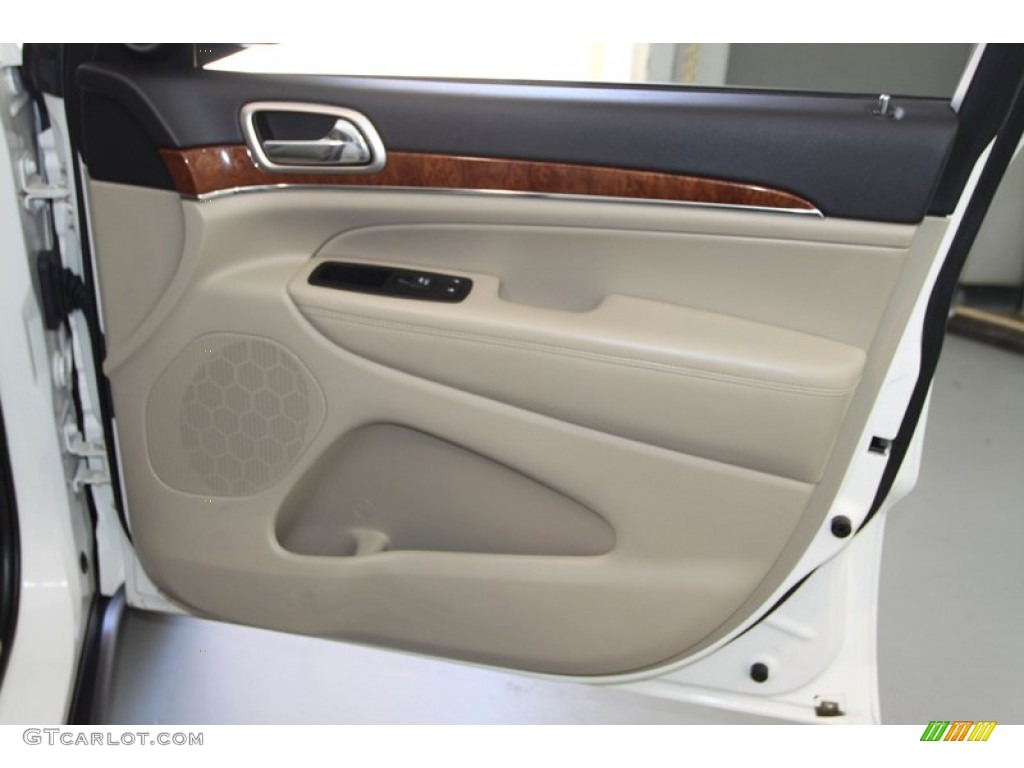 2011 Jeep Grand Cherokee Limited Black/Light Frost Beige Door Panel Photo #78024717