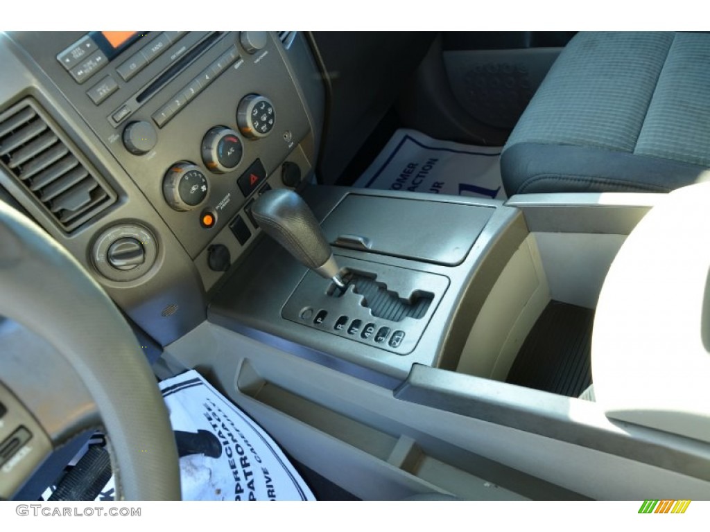 2004 Titan SE Crew Cab 4x4 - Deep Water Blue/Green / Graphite/Titanium photo #32