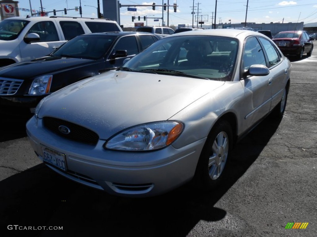 Silver Frost Metallic Ford Taurus