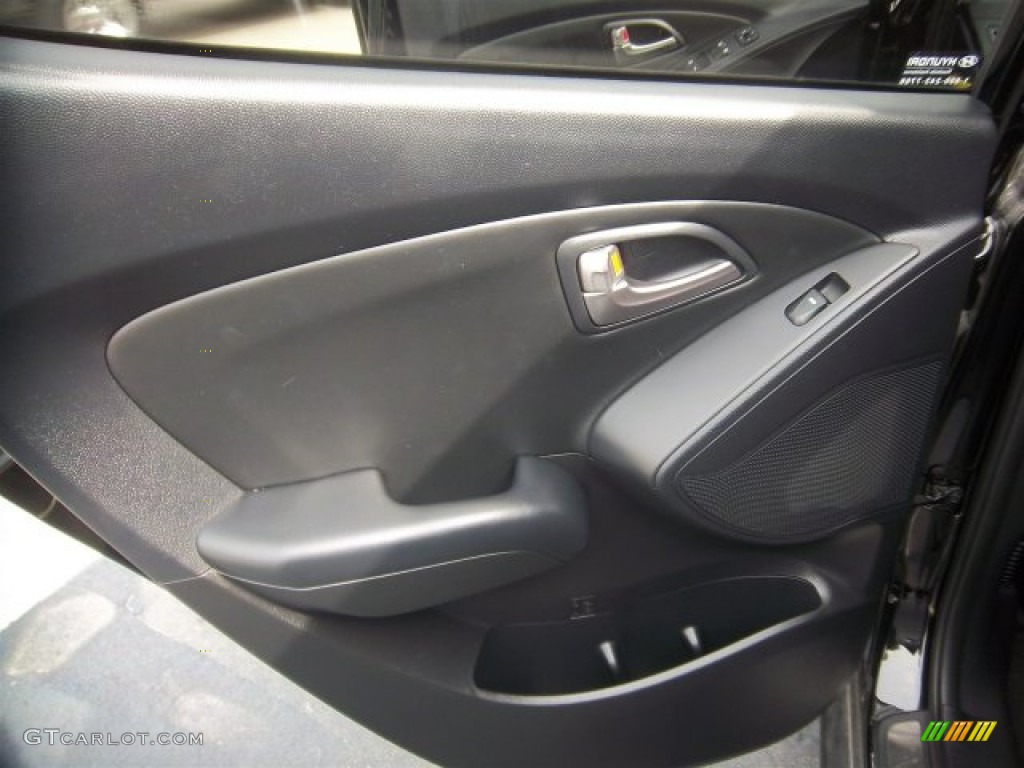 2011 Hyundai Tucson Limited Black/Saddle Door Panel Photo #78166685