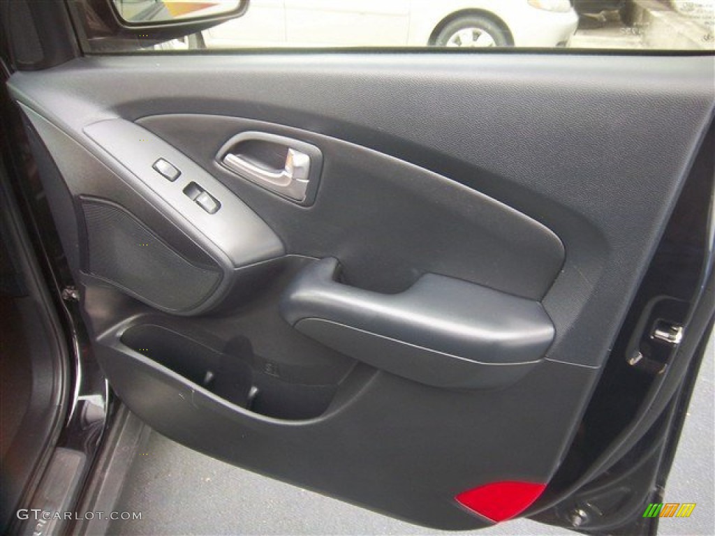 2011 Hyundai Tucson Limited Black/Saddle Door Panel Photo #78166865