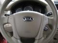 2009 Kia Sportage Beige Interior Steering Wheel Photo