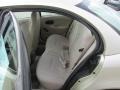 2002 Saturn S Series Tan Interior Rear Seat Photo