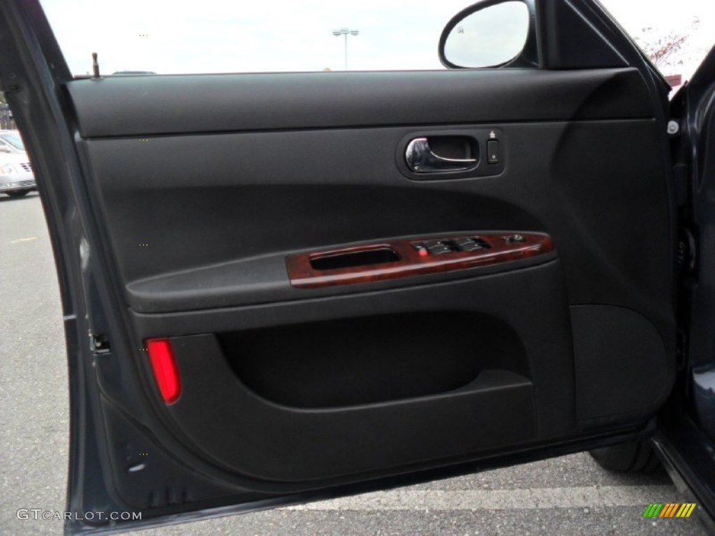 2009 Buick LaCrosse CXL Ebony Door Panel Photo #78187560
