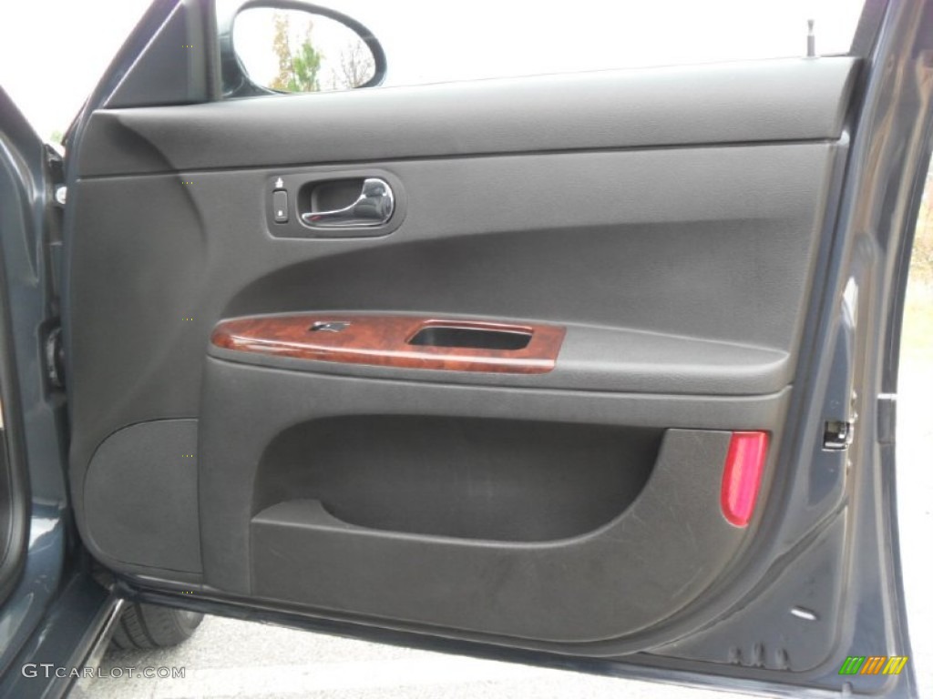 2009 Buick LaCrosse CXL Ebony Door Panel Photo #78187824