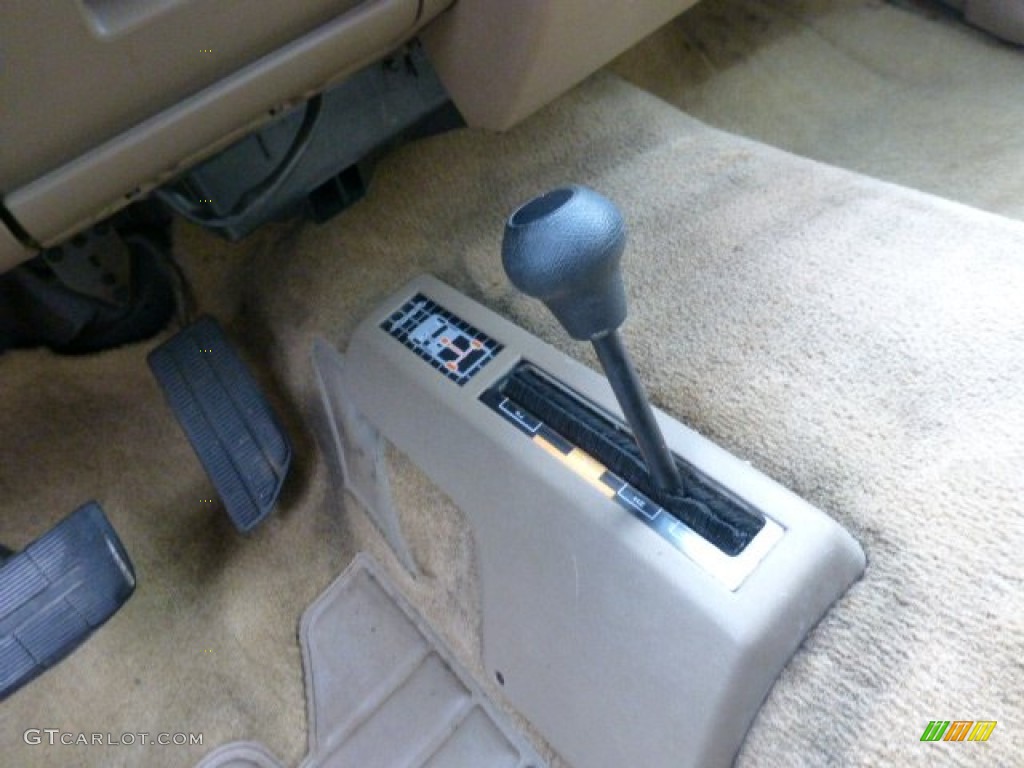 1994 Sierra 1500 SLE Extended Cab 4x4 - Bright Teal Metallic / Beige photo #11