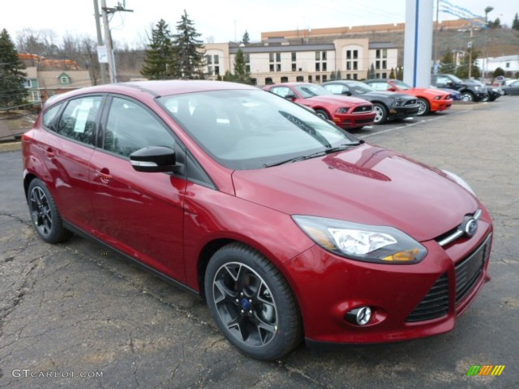 Ruby Red 2013 Ford Focus SE Hatchback Exterior Photo #78196206