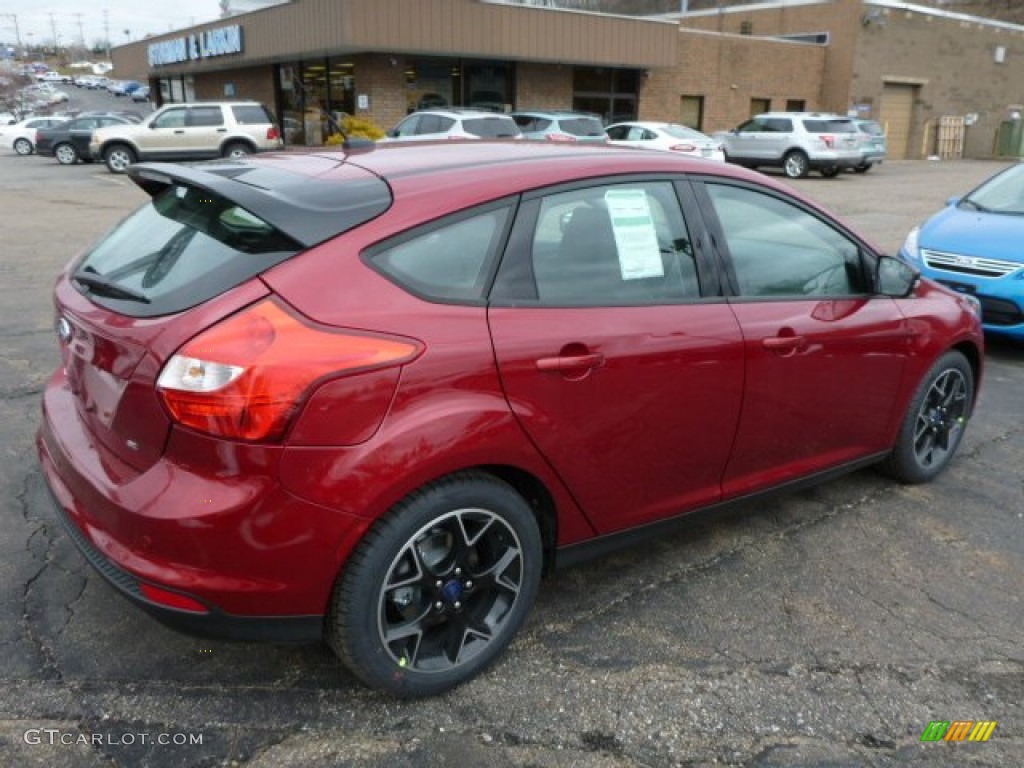 Ruby Red 2013 Ford Focus SE Hatchback Exterior Photo #78196211