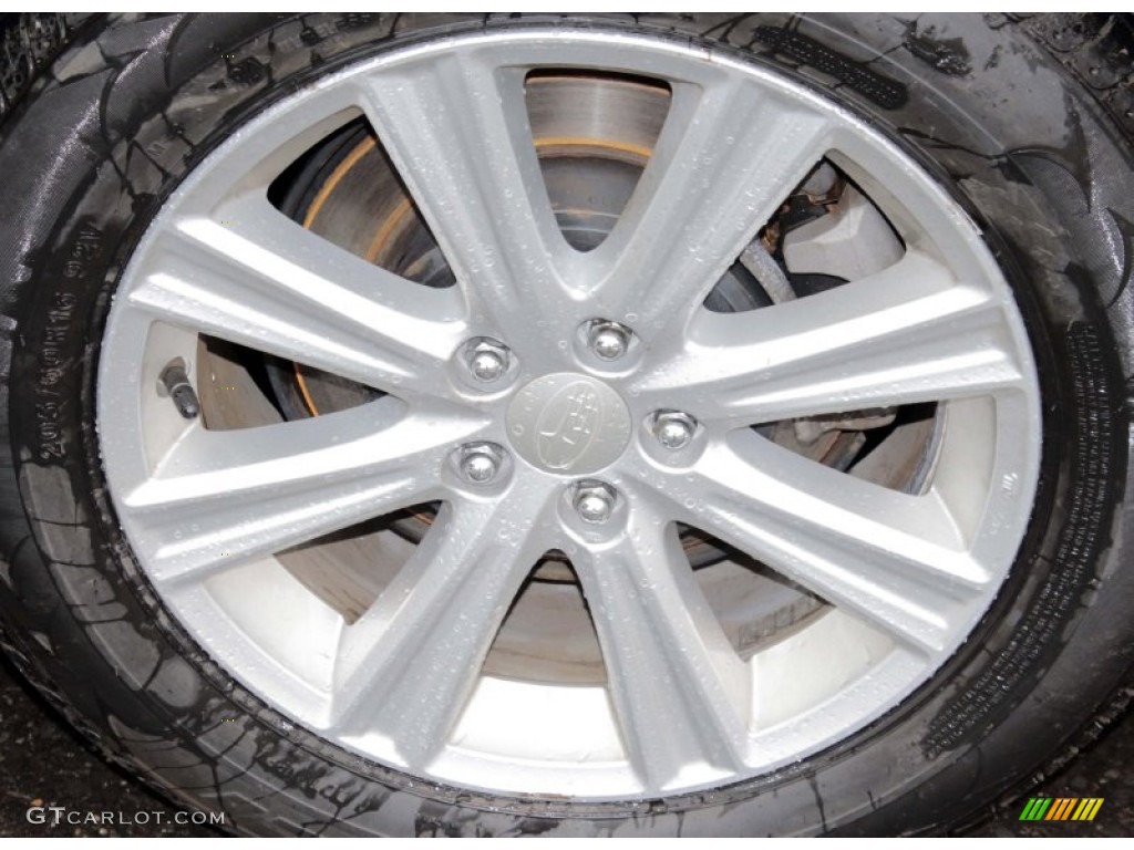 2010 Subaru Legacy 2.5i Premium Sedan Wheel Photos