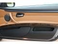 Saddle Brown Dakota Leather Door Panel Photo for 2010 BMW 3 Series #78244210