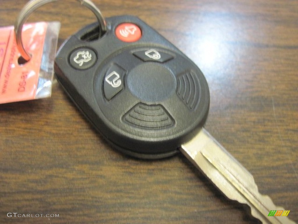 2010 Mercury Mariner I4 Premier 4WD Voga Package Keys Photos