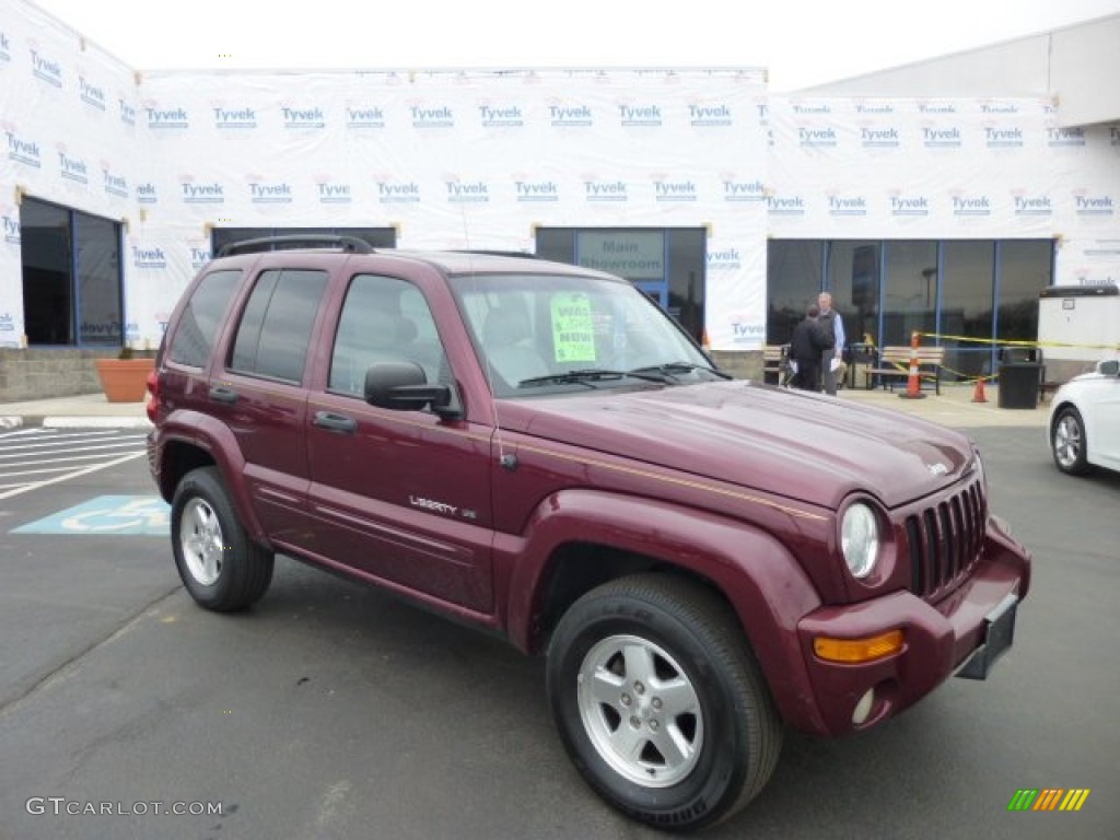 2002 Liberty Limited 4x4 - Dark Garnet Red Pearlcoat / Taupe photo #1