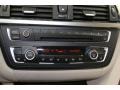 Oyster/Dark Oyster Controls Photo for 2012 BMW 3 Series #78270328