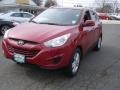 2010 Garnet Red Hyundai Tucson GLS  photo #1