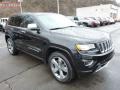 Front 3/4 View of 2014 Grand Cherokee Overland 4x4