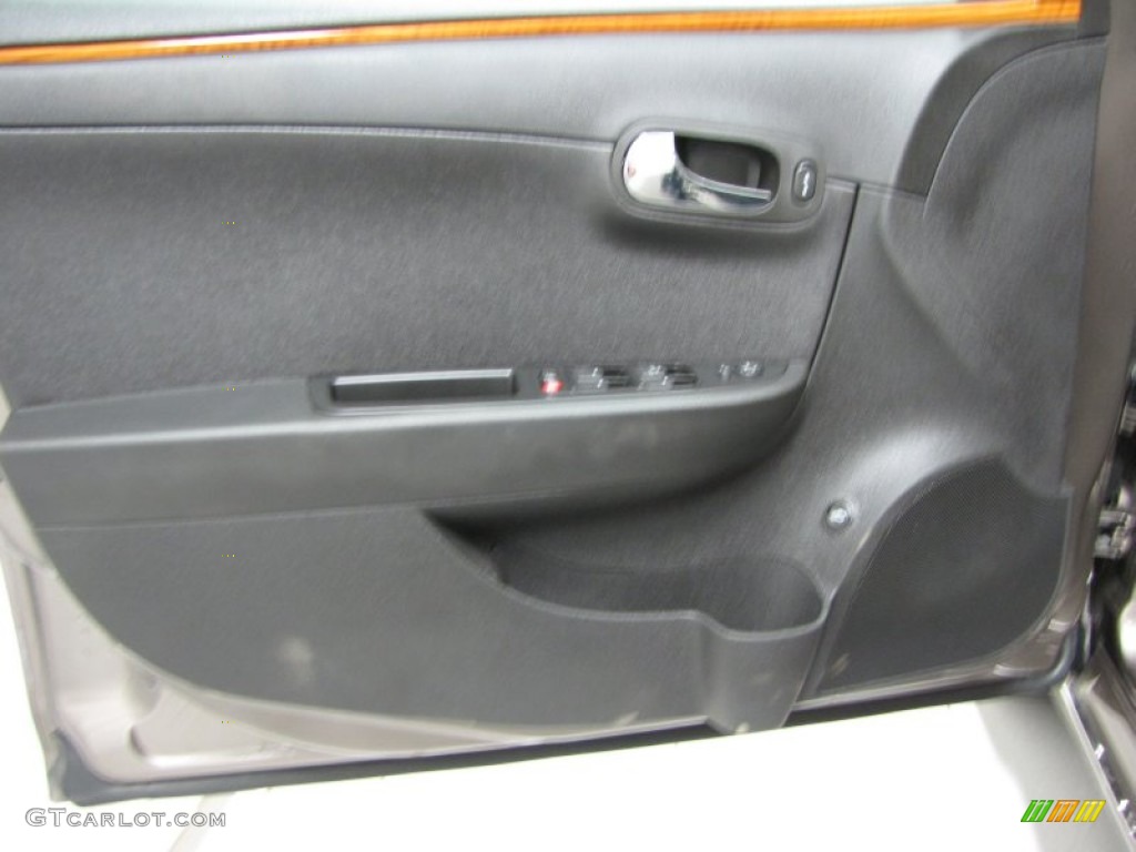 2011 Chevrolet Malibu LT Ebony Door Panel Photo #78302860