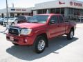 2007 Impulse Red Pearl Toyota Tacoma PreRunner Access Cab  photo #2