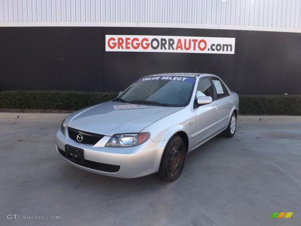 2003 Protege LX - Sunlight Silver Metallic / Off Black photo #2