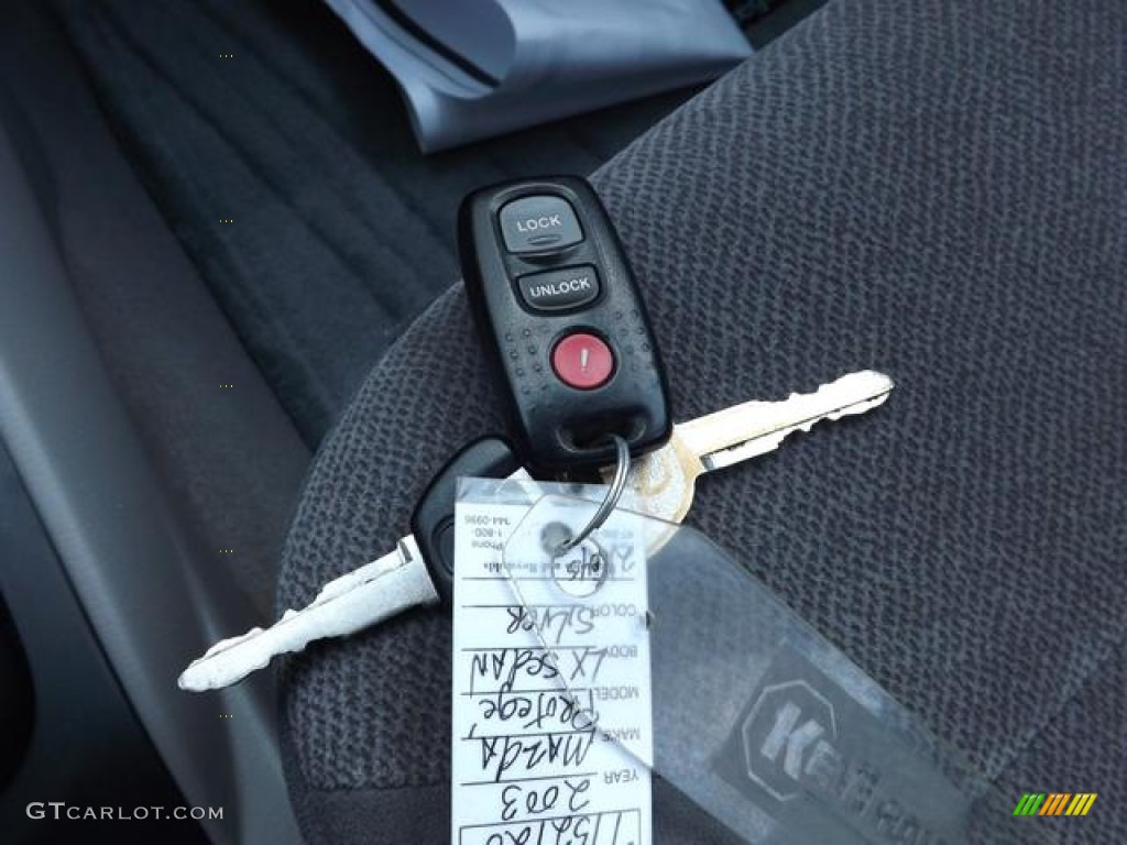 2003 Protege LX - Sunlight Silver Metallic / Off Black photo #35