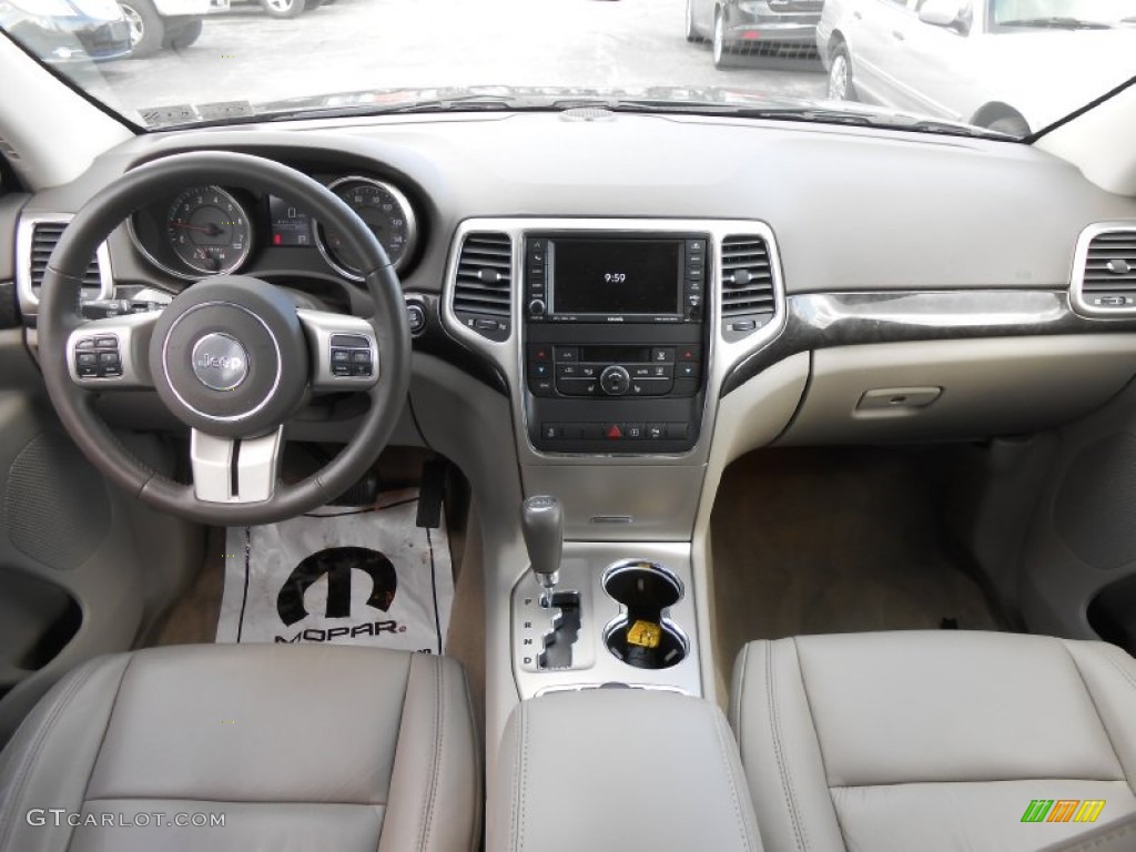 2011 Jeep Grand Cherokee Laredo X Package 4x4 Dark Graystone/Medium Graystone Dashboard Photo #78386261