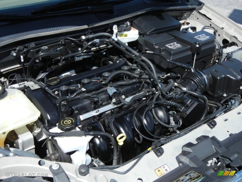 2006 Ford Focus ZX4 SE Sedan 2.0L DOHC 16V Inline 4 Cylinder Engine Photo #78386747