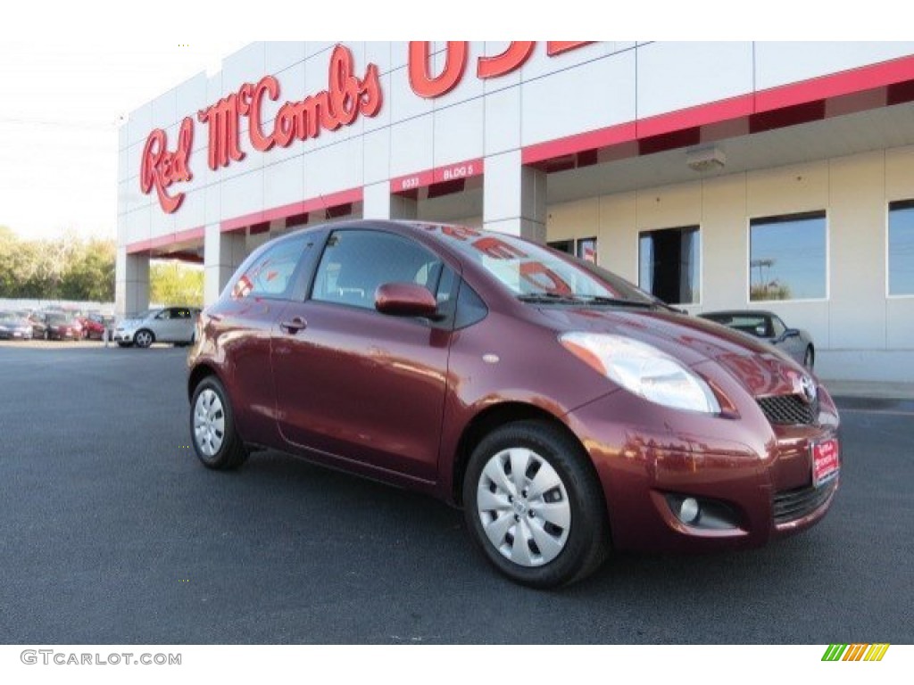 2010 Yaris 3 Door Liftback - Carmine Red Metallic / Dark Charcoal photo #1