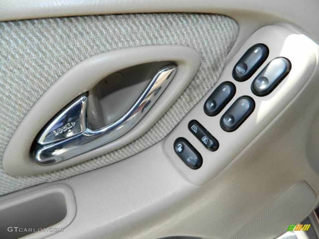 2002 Tribute LX V6 - Chestnut Metallic / Beige photo #16