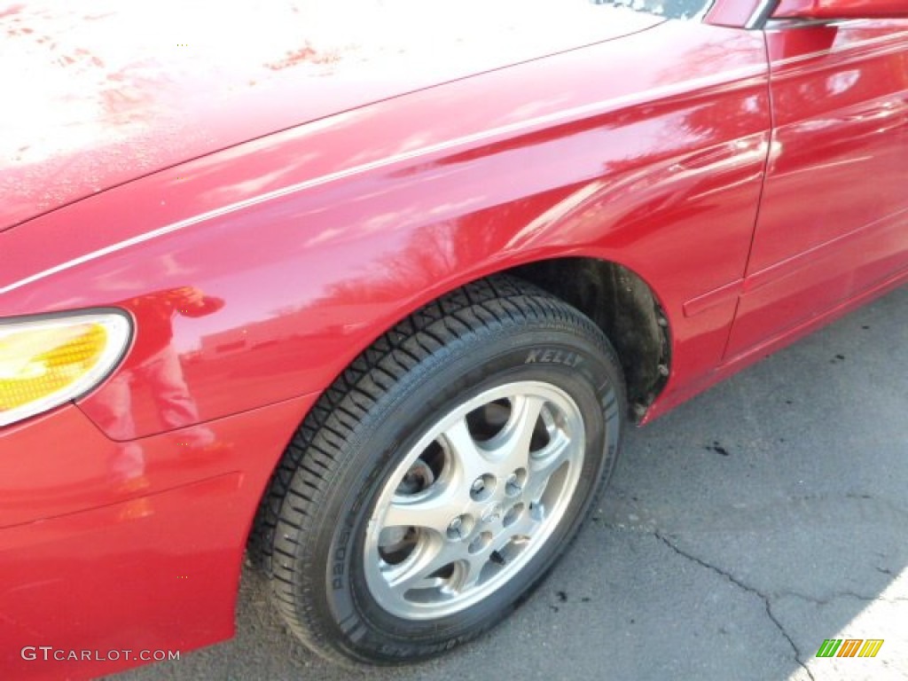 1999 Solara SE V6 Coupe - Red Flame Metallic / Ivory photo #8