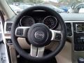 2013 Jeep Grand Cherokee Black/Light Frost Beige Interior Steering Wheel Photo