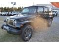 Black - Wrangler Unlimited Oscar Mike Freedom Edition 4x4 Photo No. 1