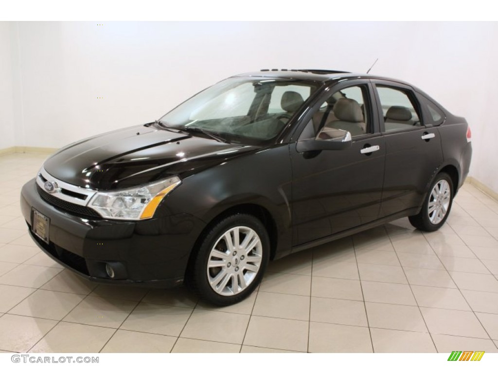 Ebony Black 2010 Ford Focus SEL Sedan Exterior Photo #78557218