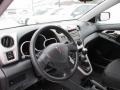 2010 Pontiac Vibe Ebony Interior Dashboard Photo