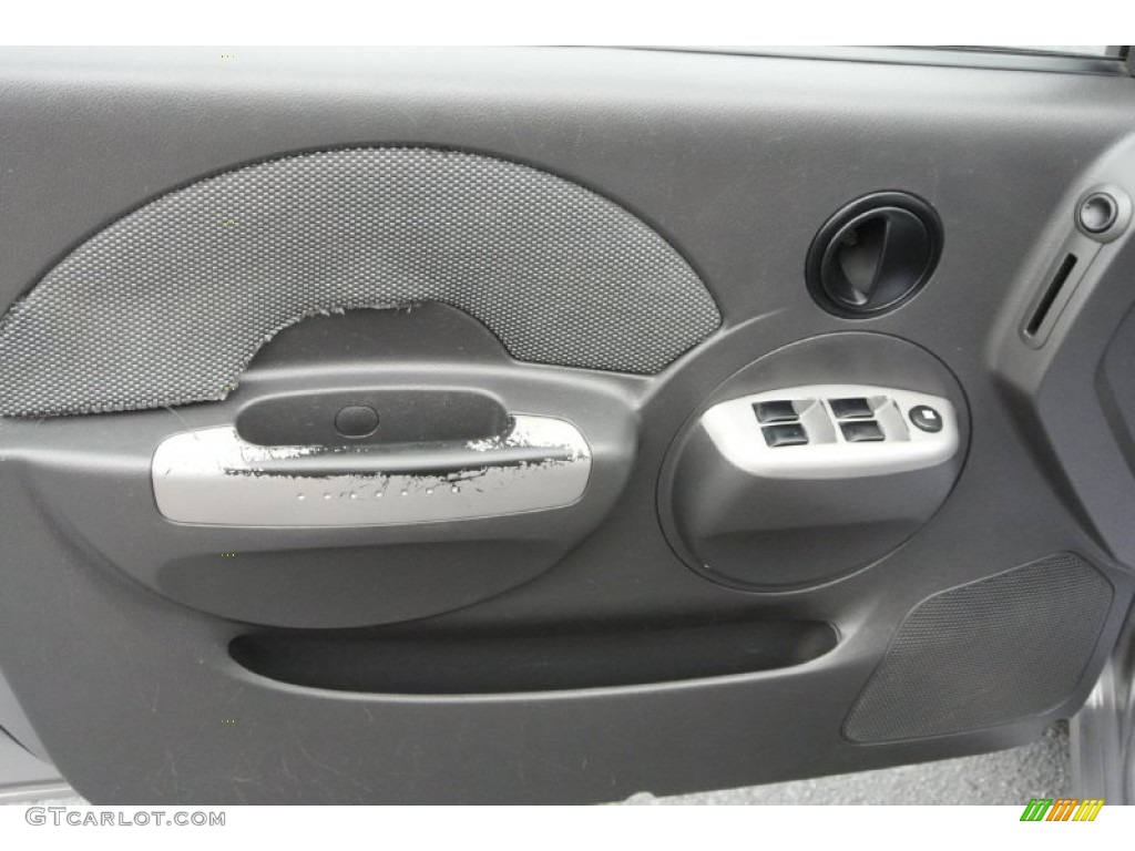 2006 Chevrolet Aveo LT Sedan Charcoal Door Panel Photo #78579188