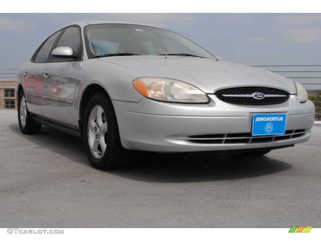 Silver Frost Metallic Ford Taurus