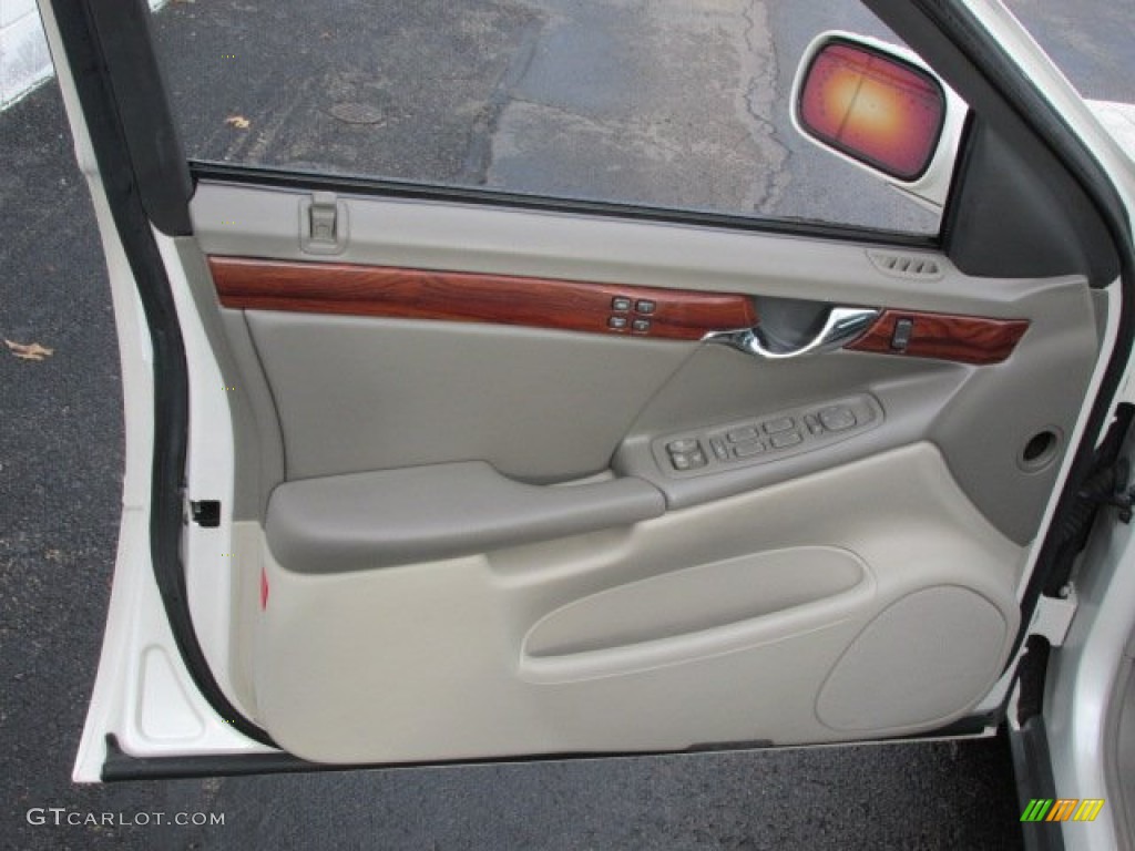 2003 Cadillac DeVille Sedan Oatmeal Door Panel Photo #78621739