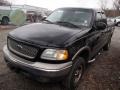 2002 Black Ford F150 XLT SuperCab 4x4  photo #3