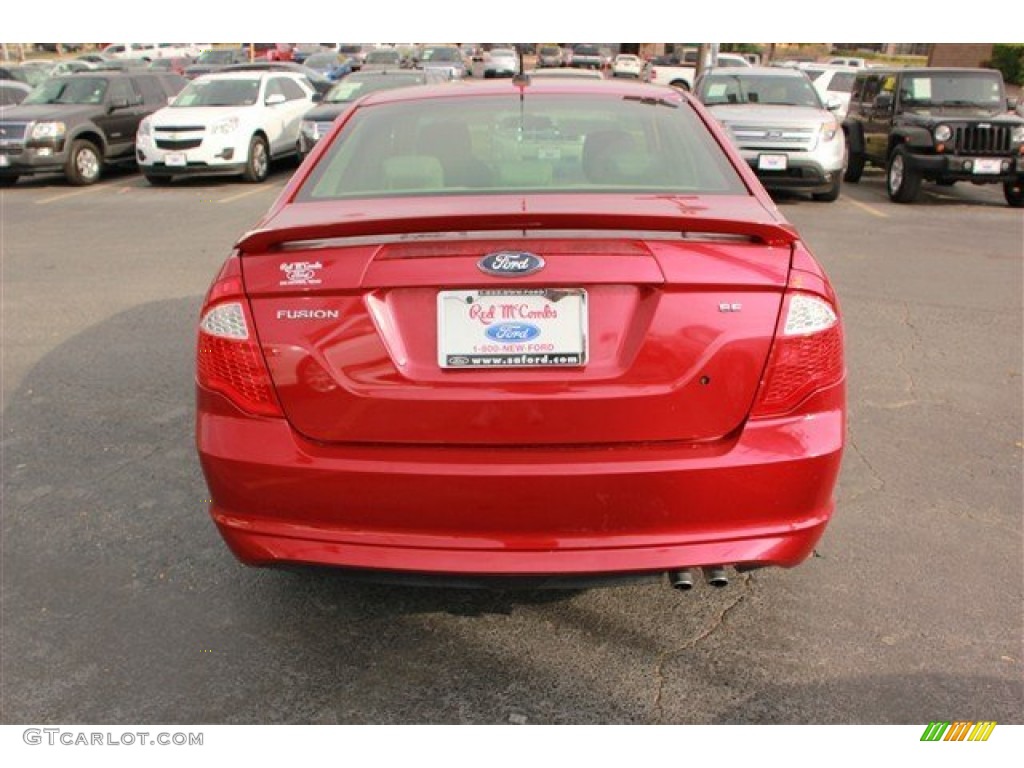 2010 Fusion SE - Red Candy Metallic / Camel photo #6