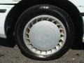 1993 Ford Escort LX Sedan Wheel and Tire Photo