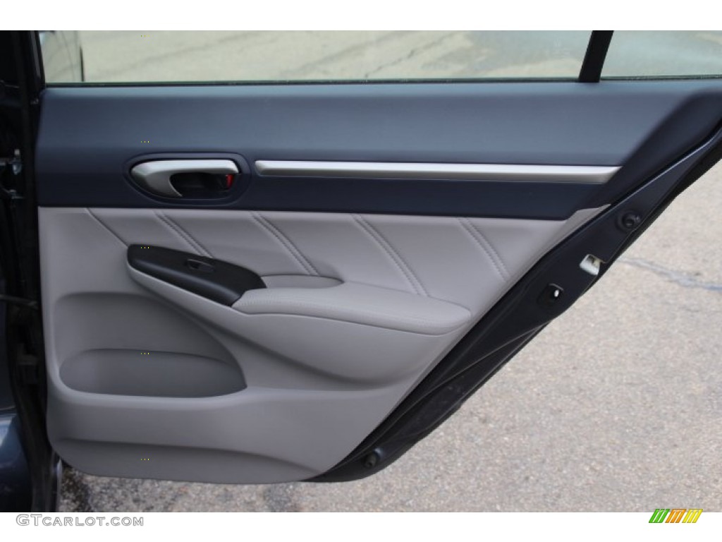 2009 Honda Civic Hybrid Sedan Blue Door Panel Photo #78686679
