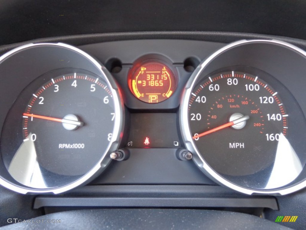 2010 Nissan Rogue S AWD Gauges Photos