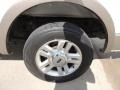 2004 Ford F150 Lariat SuperCab Wheel and Tire Photo