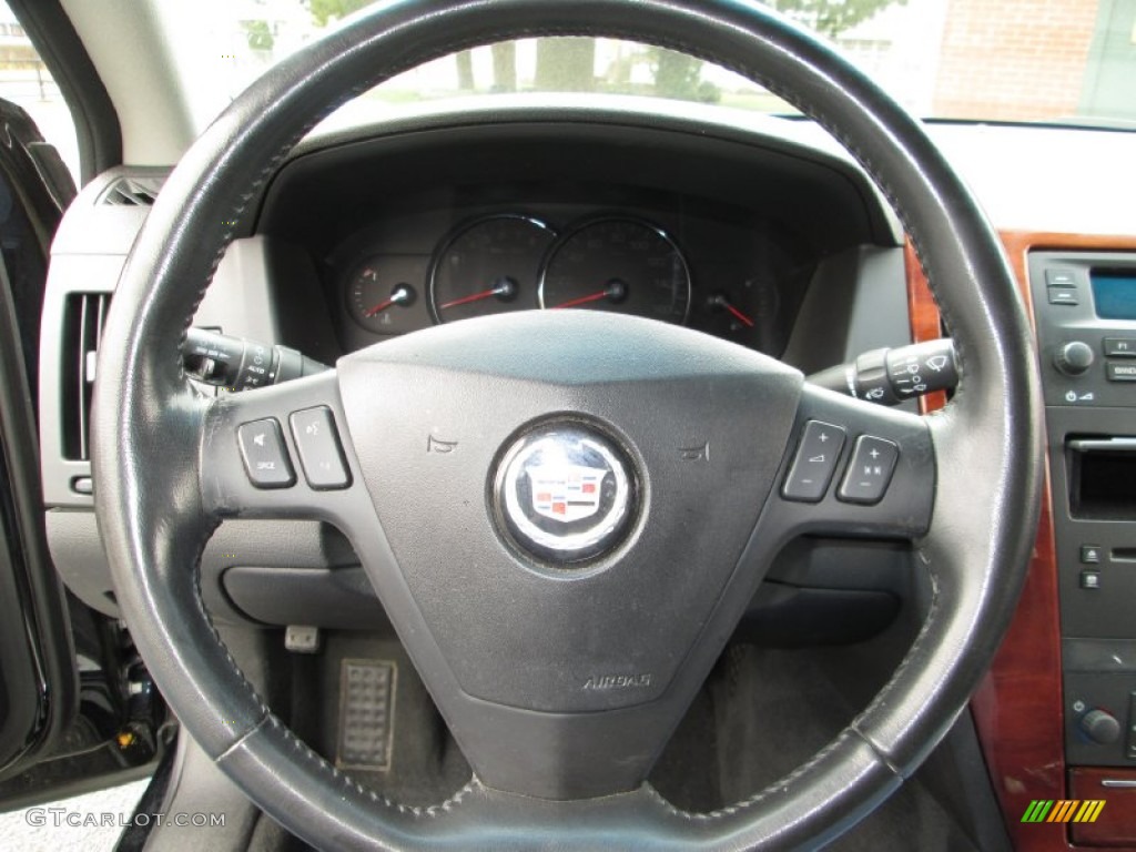2006 Cadillac STS V6 Ebony Steering Wheel Photo #78708647